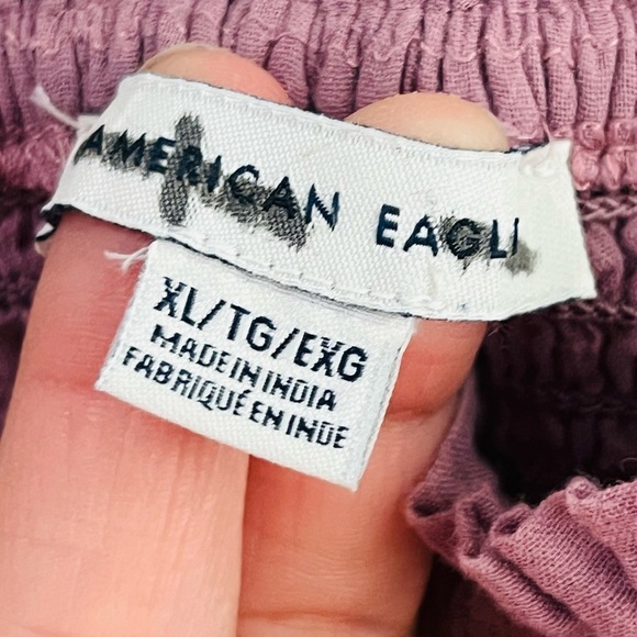 AMERICAN EAGLE WOMEN PURPLE SQUARE NECK SMOCKED PEASANT TOP
XL - Picture 6 of 15